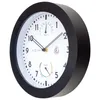 A close-up, angled view of a black and white wall clock with integrated thermometer and hygrometer, set against a white background. Náhled obrázku produktu