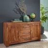 A wooden sideboard with decorative items on top, including vases, a globe, and a plant in the background. Produktbild-Vorschau