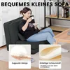 A woman is sitting on a dark gray sofa, drinking from a cup. There are inset images showing material details. Produktbild-Vorschau