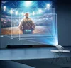A small white projector is projecting a large image onto a wall, showing different screen size options and distances. Produktbild-Vorschau