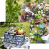 A collage of images showing a family having a picnic and a close-up of a picnic basket. Náhled obrázku produktu