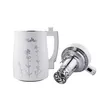 A white MioMat plant-based milk maker with a silver floral design and a detached silver and white processing unit are shown against a white background. Produktbild-Vorschau