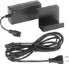 A black power adapter with a green indicator light, a black charging cradle, and a black power cord with a European plug. Náhled obrázku produktu