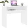 A white desk with a laptop, a book, and a plant. Podgląd zdjęcia produktu