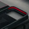 Close-up of a black phone case with a red accent, showing the interior texture and a portion of the exterior. Anteprima dell’immagine prodotto