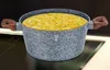 A pot of soup on a stovetop. Náhľad obrázku produktu