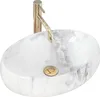 A white marble oval basin with a gold faucet and drain. Produktbild-Vorschau