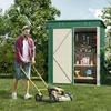 A man is mowing the lawn in front of a garden shed filled with tools. Anteprima dell’immagine prodotto