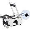 A semi-automatic bottle labeling machine is shown against a white background. Náhled obrázku produktu