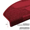 A close-up view of a red, half-round stair mat, showing its texture and edge. Produktbild-Vorschau