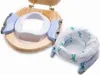 A portable potty seat and disposable liners are shown on a white background. Produktbild-Vorschau