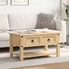 A wooden coffee table with two drawers and a lower shelf is placed in front of a white sofa in a living room setting. A book and a cup are on the table. Voir les images du produit