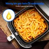 An air fryer basket filled with french fries, with a graphic of a drop of oil and text overlay. Produktbild-Vorschau
