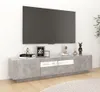 A modern living room setup with a TV mounted on the wall above a sleek, gray media console. Produktbild-Vorschau