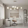 A modern home office with a desk, chair, laptop, and a large abstract painting on the wall. Náhľad obrázku produktu