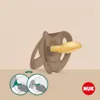 A NUK pacifier with instructional diagrams. Produktbild-Vorschau