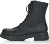 A black leather boot on a white background. Produktbild-Vorschau