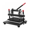 A manual die-cutting and embossing press machine is shown against a white background. Náhled obrázku produktu