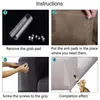 Instructions for applying anti-scratch pads to furniture, with a cat shown interacting with the protected furniture. Produktbild-Vorschau