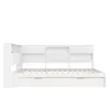A white daybed with a bookshelf headboard and a pull-out trundle bed is shown from the side against a white background. Produktbild-Vorschau