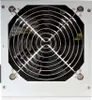 A close-up view of the front of a computer power supply unit, showing the fan and grille. Anteprima dell’immagine prodotto