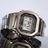 A close-up shot of a silver Casio G-Shock watch with a digital display. Podgląd zdjęcia produktu