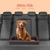 A dog sitting in a pet bed on a car seat. Náhled obrázku produktu