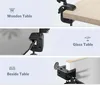 Collage showing a clamp-style holder attached to different types of tables: a wooden table, a glass table, and a bedside table. Podgląd zdjęcia produktu