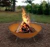 A fire pit with burning logs in a backyard setting. Produktbild-Vorschau