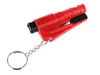 A red keychain tool with a seatbelt cutter and window breaker. Produktbild-Vorschau