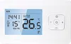 A white smart thermostat with a blue digital display showing time, temperature, and settings. Podgląd zdjęcia produktu