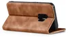 A brown flip cover case for a smartphone is shown from the side, standing open. Produktbild-Vorschau