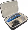 A Philips hair clipper set with accessories inside an open storage case. Produktbild-Vorschau