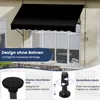 A black awning is installed above a set of glass doors on a building. In the foreground, there are close-up diagrams of the awning's mounting components. Anteprima dell’immagine prodotto