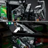 Close-up shots of a LEGO Technic 4x4 Mercedes-Benz Zetros Offroad-Truck model, highlighting mechanical details and assembly steps. Podgląd zdjęcia produktu