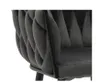 A close-up view of a gray upholstered chair with a braided design. Náhled obrázku produktu