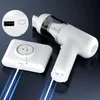 A white handheld vacuum cleaner and its charging base are displayed on a dark background, with blue light streaks indicating charging. Produktbild-Vorschau
