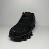 A studio shot of a black Nike Shox TL sneaker against a white background. Produktbild-Vorschau