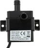 A close-up studio shot of a black water pump with a label showing specifications. Podgląd zdjęcia produktu
