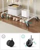 A rolling garment rack with shoes on the bottom shelf, and a basket and box on the top shelf. Below are close-ups of two types of casters. Náhled obrázku produktu
