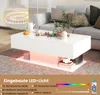 A white coffee table with LED lighting in a living room setting. Voir les images du produit