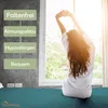 A woman stretching in bed by a window, with feature callouts on the left. Produktbild-Vorschau