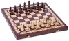 A wooden chess set with pieces arranged on the board. Anteprima dell’immagine prodotto