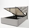 A bed frame with the mattress support lifted to reveal storage space underneath. Produktbild-Vorschau