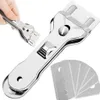 A close-up shot of a glass scraper and spare blades against a white background. A hand is shown holding a smaller part of the scraper. Náhľad obrázku produktu
