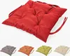 A main image of a red seat cushion with smaller images of other colored seat cushions below. Produktbild-Vorschau