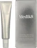 A silver tube of eye cream and its matching silver box are displayed side-by-side against a white background. Produktbild-Vorschau