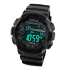 A digital watch with a black band and a green digital display. Podgląd zdjęcia produktu