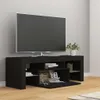 A black TV stand with a television on top, in a room with light gray walls and a wooden floor. Anteprima dell’immagine prodotto