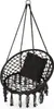 A black macrame hanging chair with a black cushion, suspended by ropes. Voir les images du produit